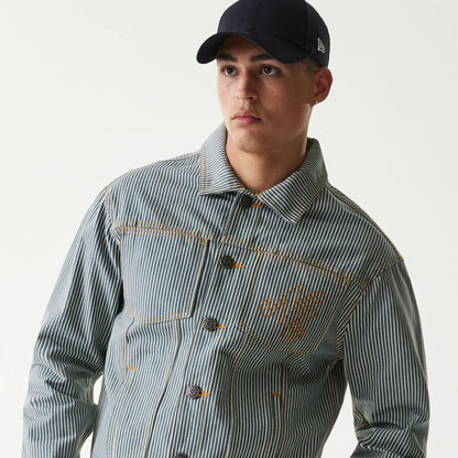The Male model is wearing New Era Blue Denim Jacket 7