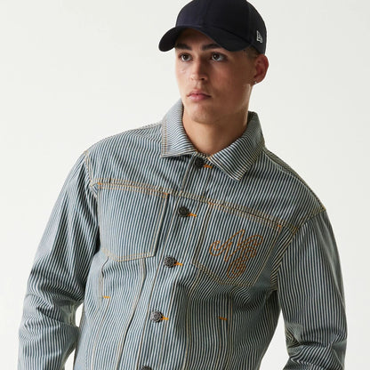 The Male model is wearing New Era Blue Denim Jacket 7