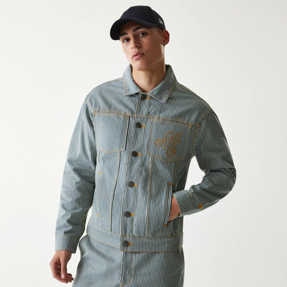 The Male model is wearing New Era Blue Denim Jacket 1