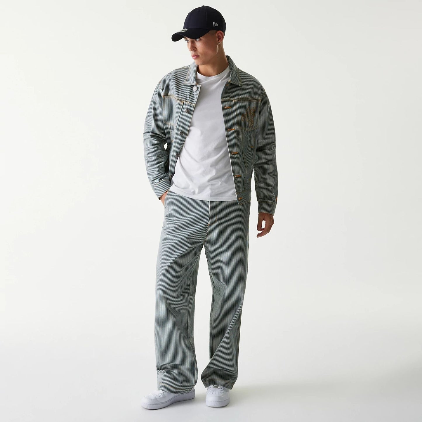 The Male model is wearing New Era Blue Denim Jacket 6