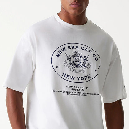 The Male model is wearing New Era Crest White Oversized T-Shirt 3