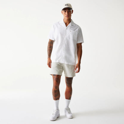 The Male model is wearing New Era Cream Chino Shorts 8