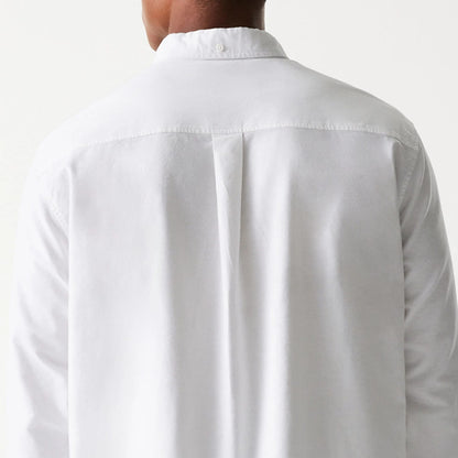 The Male model is wearing New Era White Long Sleeve Shirt 7