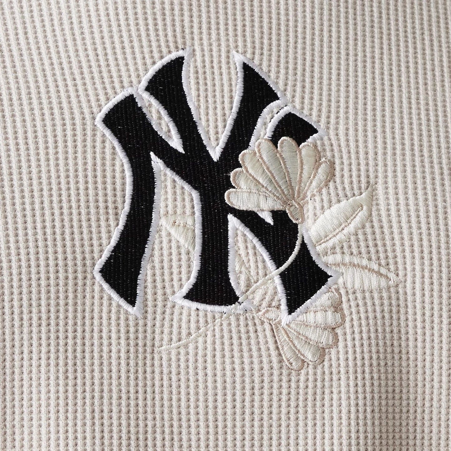 The Male model is wearing New York Yankees MLB Waffle Cream Oversized Crew Neck Sweater 7