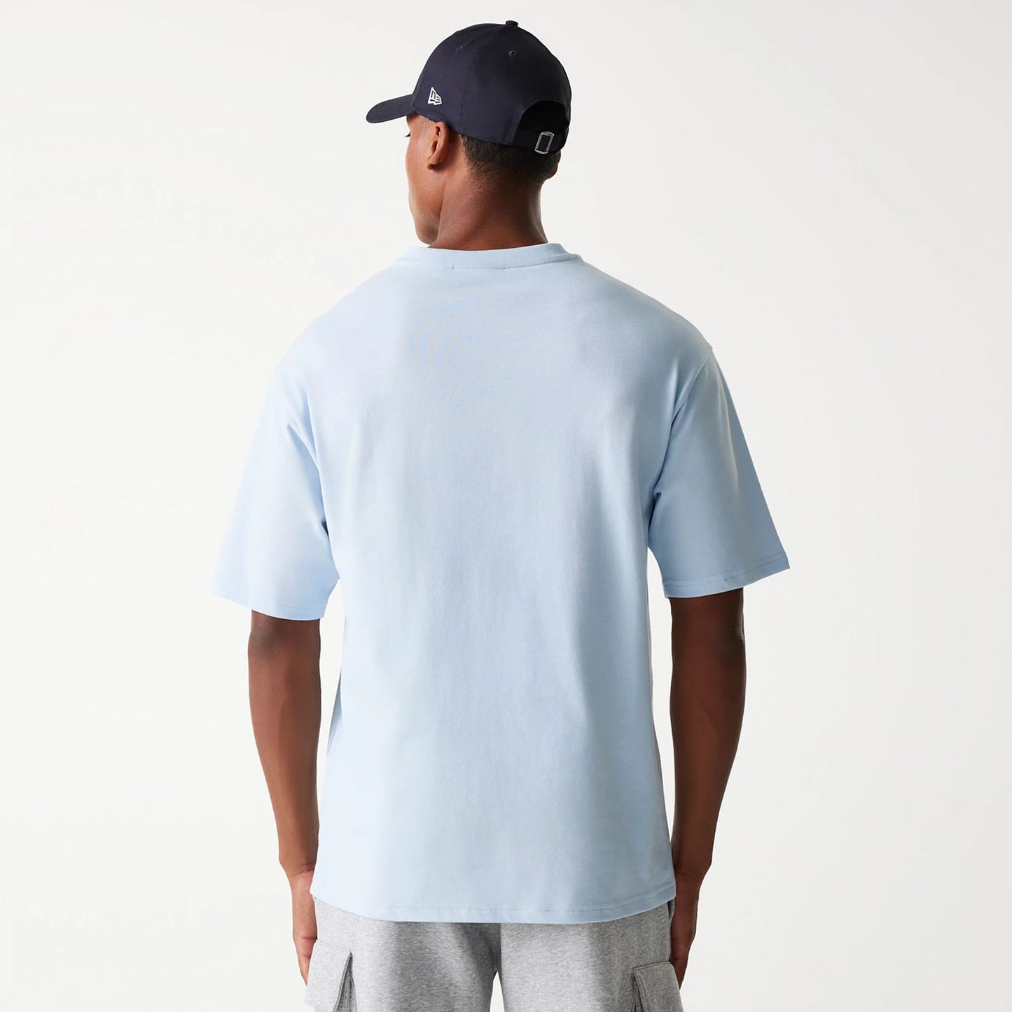 The Male model is wearing New York Yankees MLB World Series Pastel Blue Oversized T-Shirt 2
