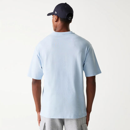 The Male model is wearing New York Yankees MLB World Series Pastel Blue Oversized T-Shirt 2
