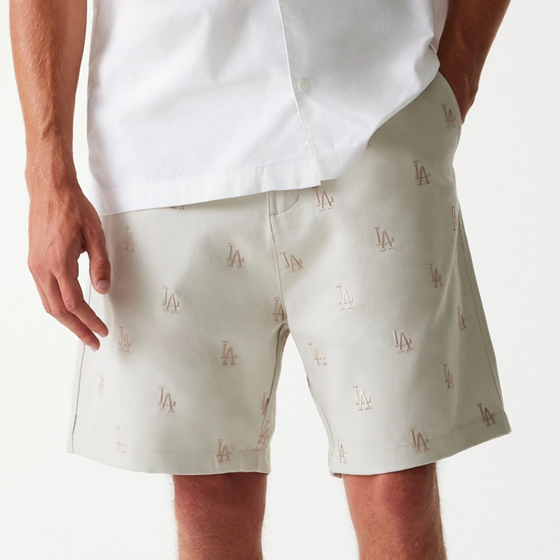 The Male model is wearing LA Dodgers MLB Monogram Cream Shorts 3