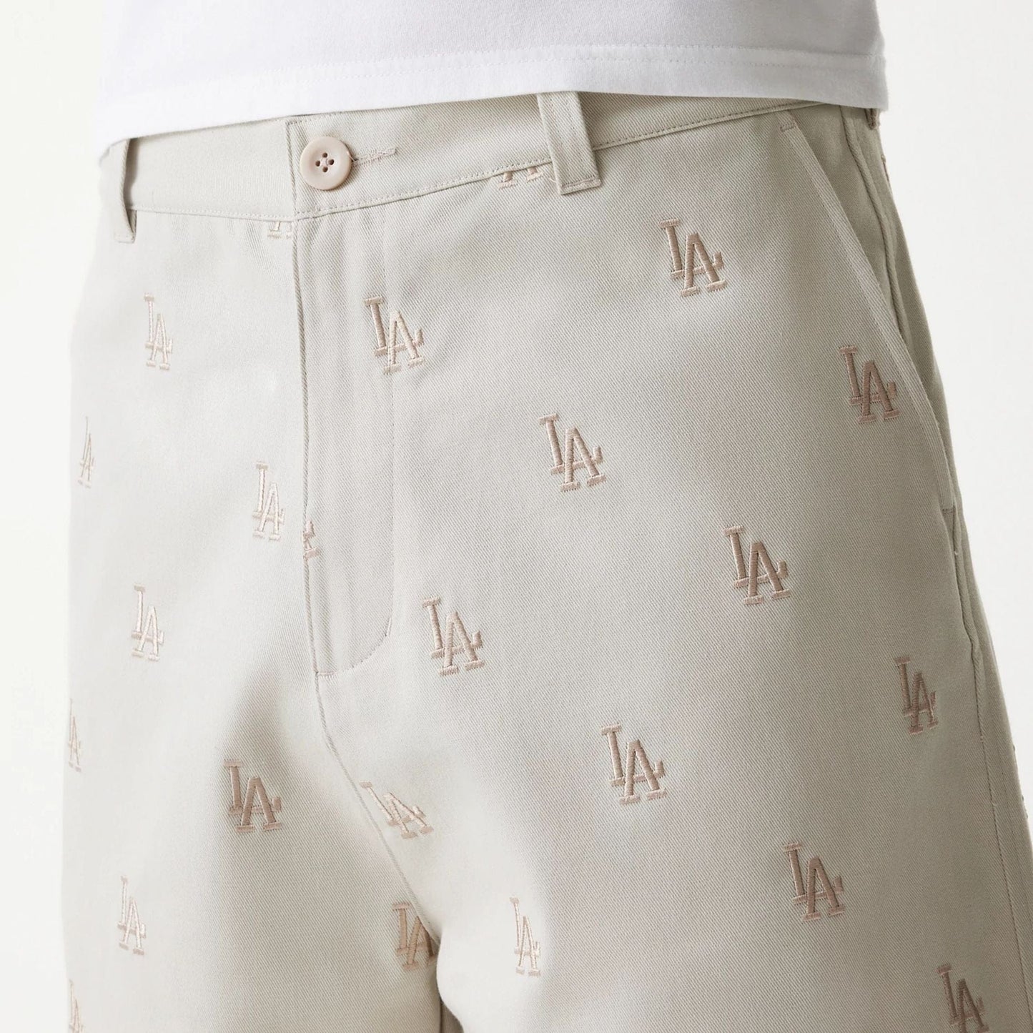 The Male model is wearing LA Dodgers MLB Monogram Cream Shorts 6