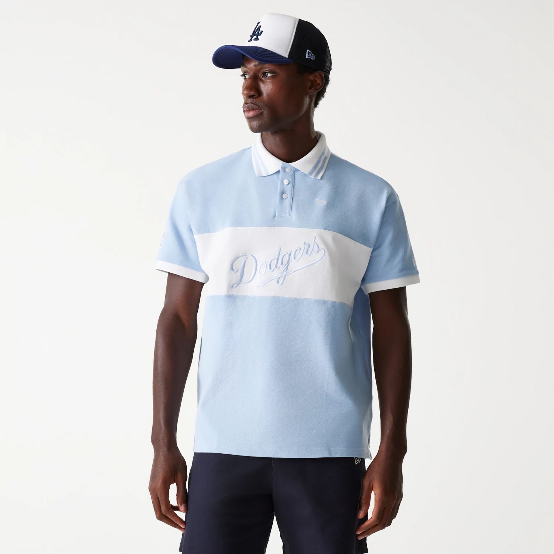 The Male model is wearing LA Dodgers MLB Graphic Pastel Blue Polo Shirt 1