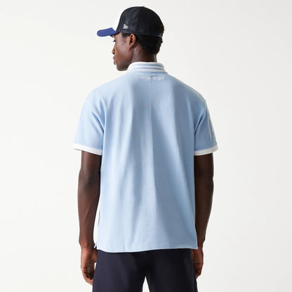The Male model is wearing LA Dodgers MLB Graphic Pastel Blue Polo Shirt 2