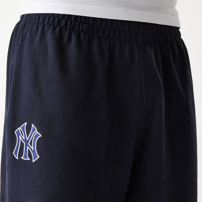 The Male model is wearing New York Yankees MLB Pique Navy Shorts 4