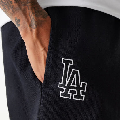 The Male model is wearing LA Dodgers MLB Pique Black Shorts 4