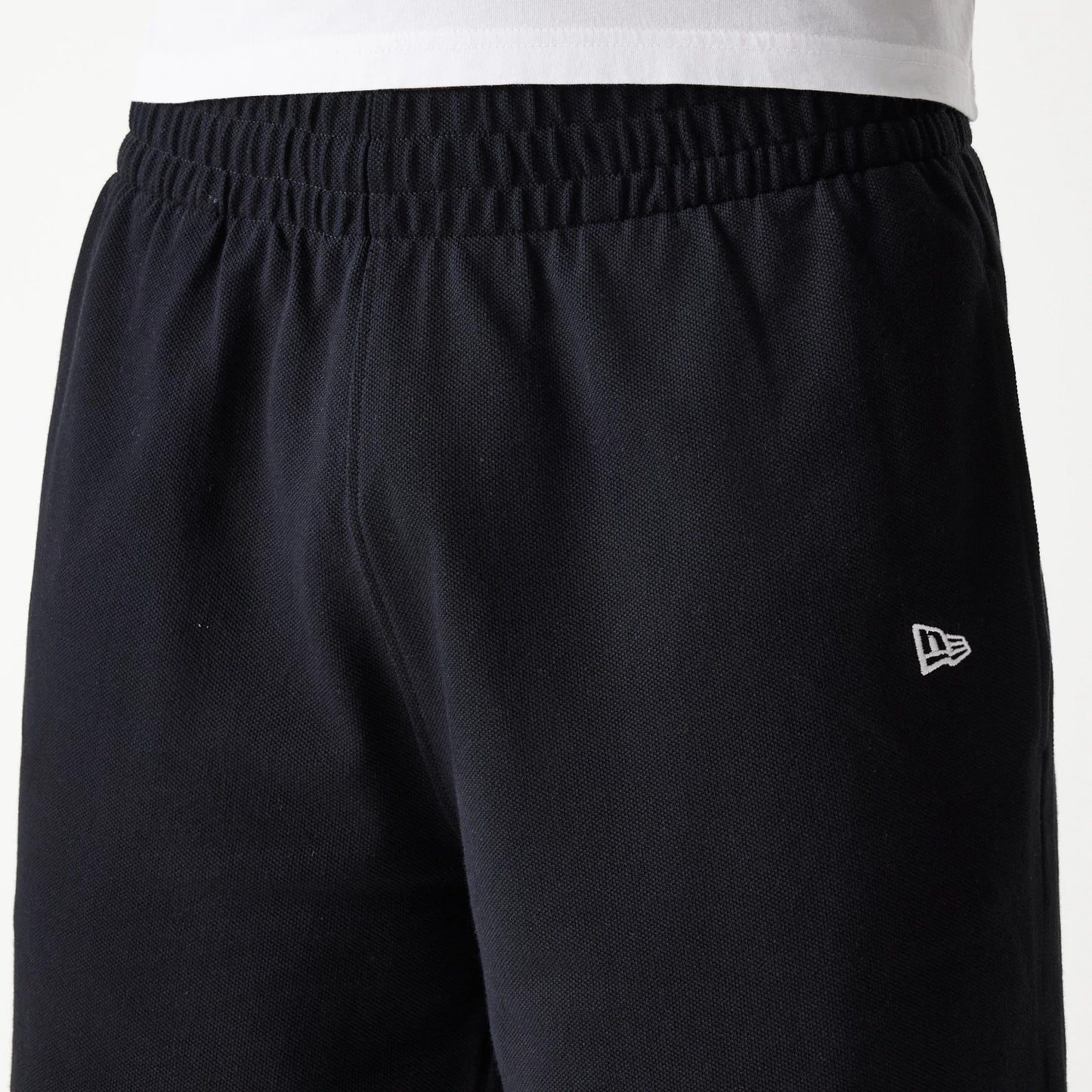 The Male model is wearing LA Dodgers MLB Pique Black Shorts 5