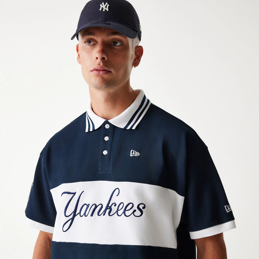 The Male model is wearing New York Yankees MLB Graphic Navy Polo Shirt 5