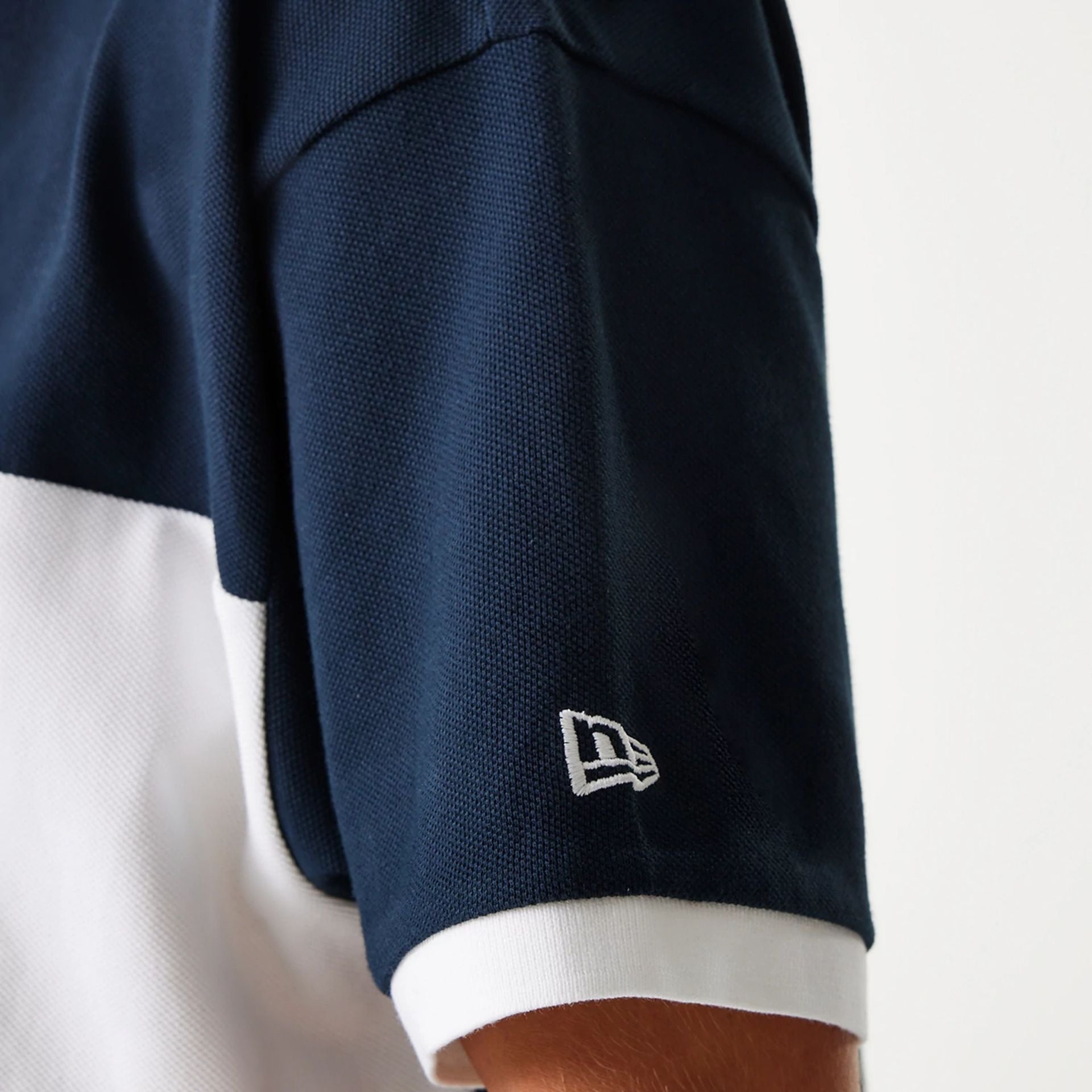 The Male model is wearing New York Yankees MLB Graphic Navy Polo Shirt 6