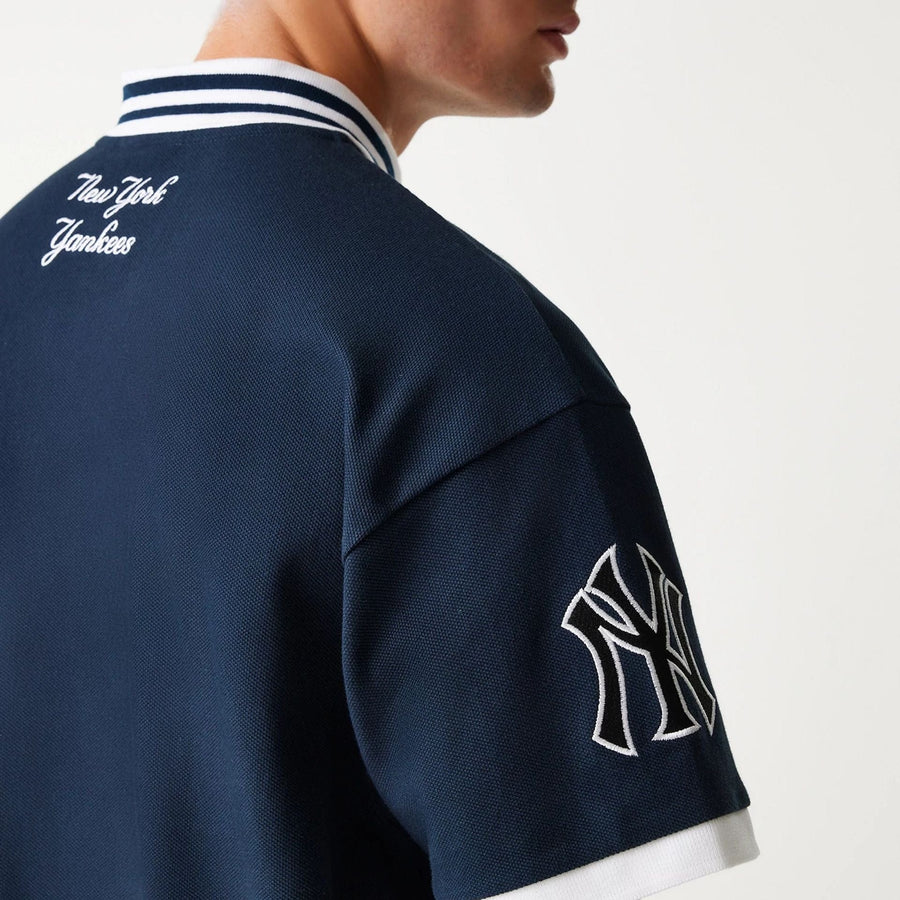 The Male model is wearing New York Yankees MLB Graphic Navy Polo Shirt 7