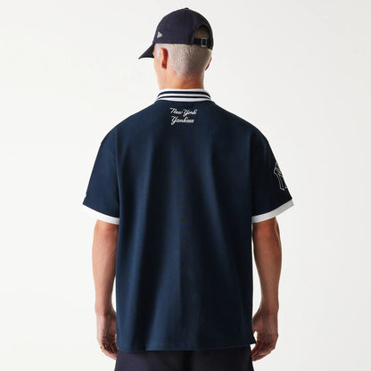 The Male model is wearing New York Yankees MLB Graphic Navy Polo Shirt 2