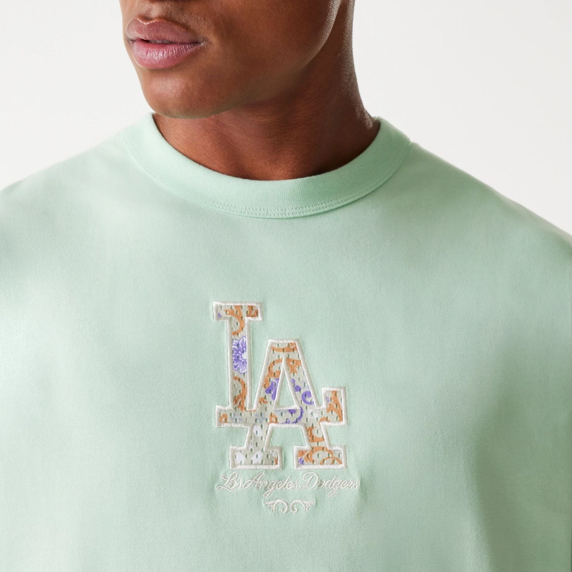 The Male model is wearing LA Dodgers MLB Infill Pastel Green Oversized T-Shirt 6