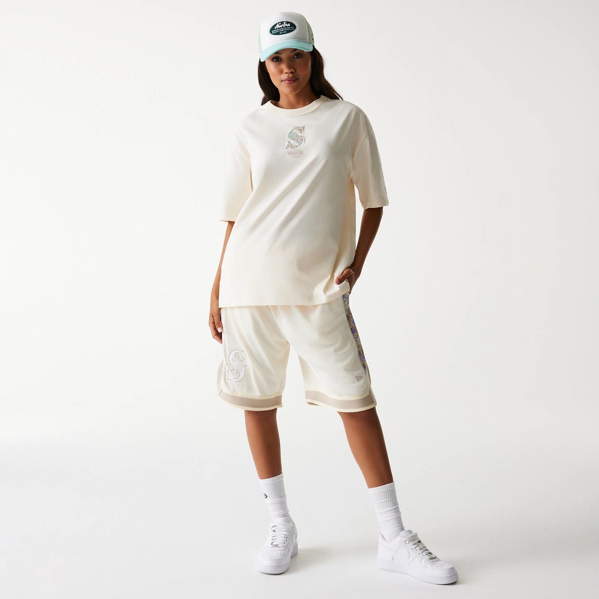 The Male model is wearing Seattle Mariners MLB Infill Open White Oversized T-Shirt 6