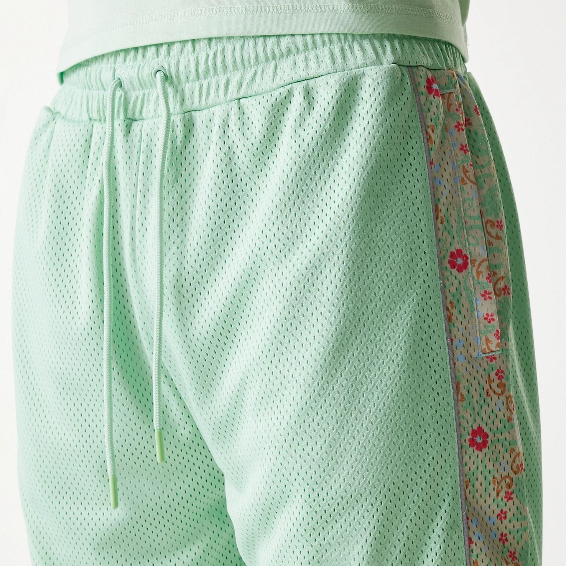 The Male model is wearing LA Dodgers MLB Infill Pastel Green Mesh Shorts 7