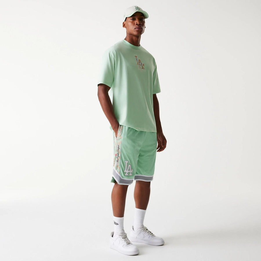 The Male model is wearing LA Dodgers MLB Infill Pastel Green Mesh Shorts 8