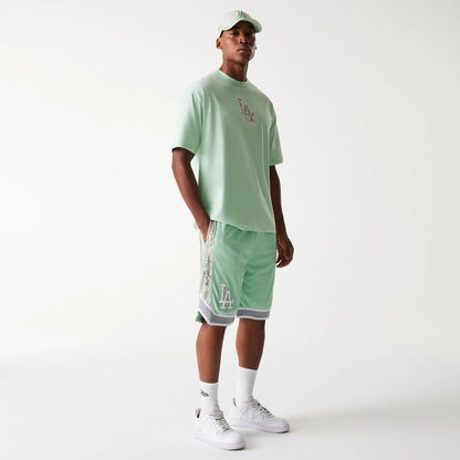 The Male model is wearing LA Dodgers MLB Infill Pastel Green Mesh Shorts 8
