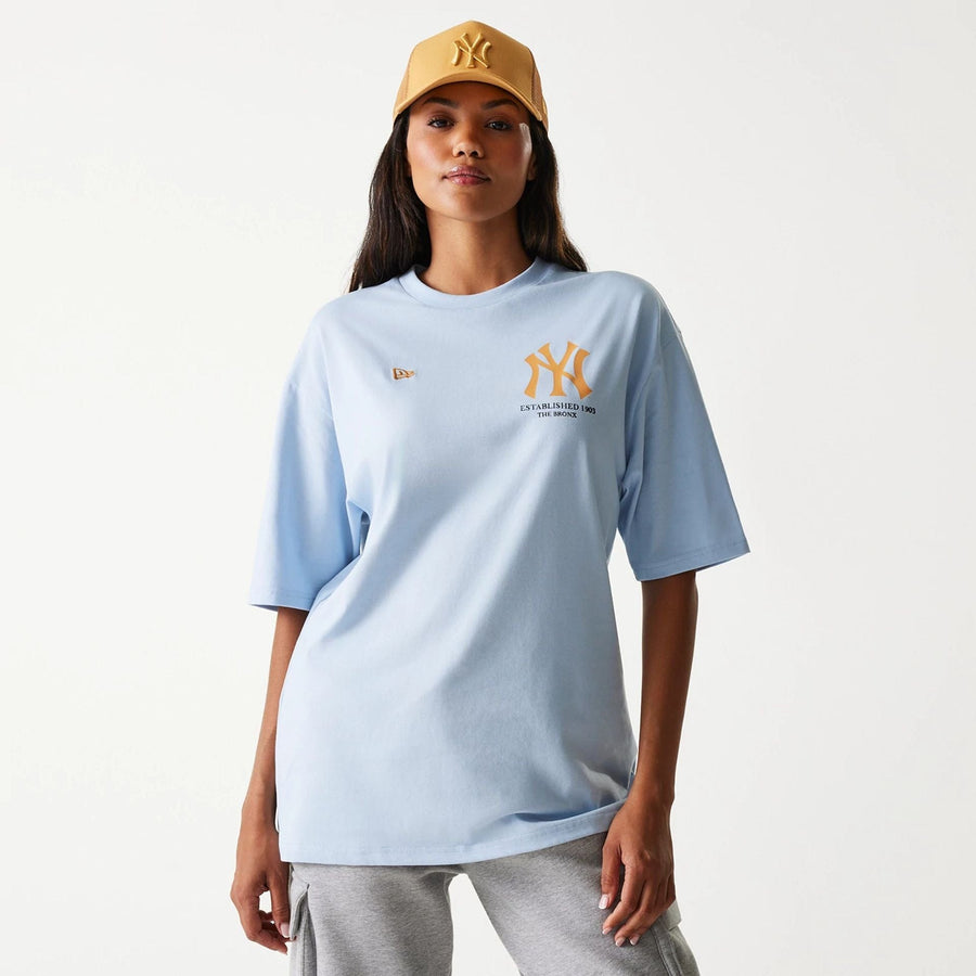The Male model is wearing New York Yankees MLB Baseball Graphic Pastel Blue Oversized T-Shirt 5