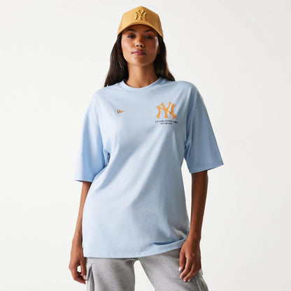 The Male model is wearing New York Yankees MLB Baseball Graphic Pastel Blue Oversized T-Shirt 5