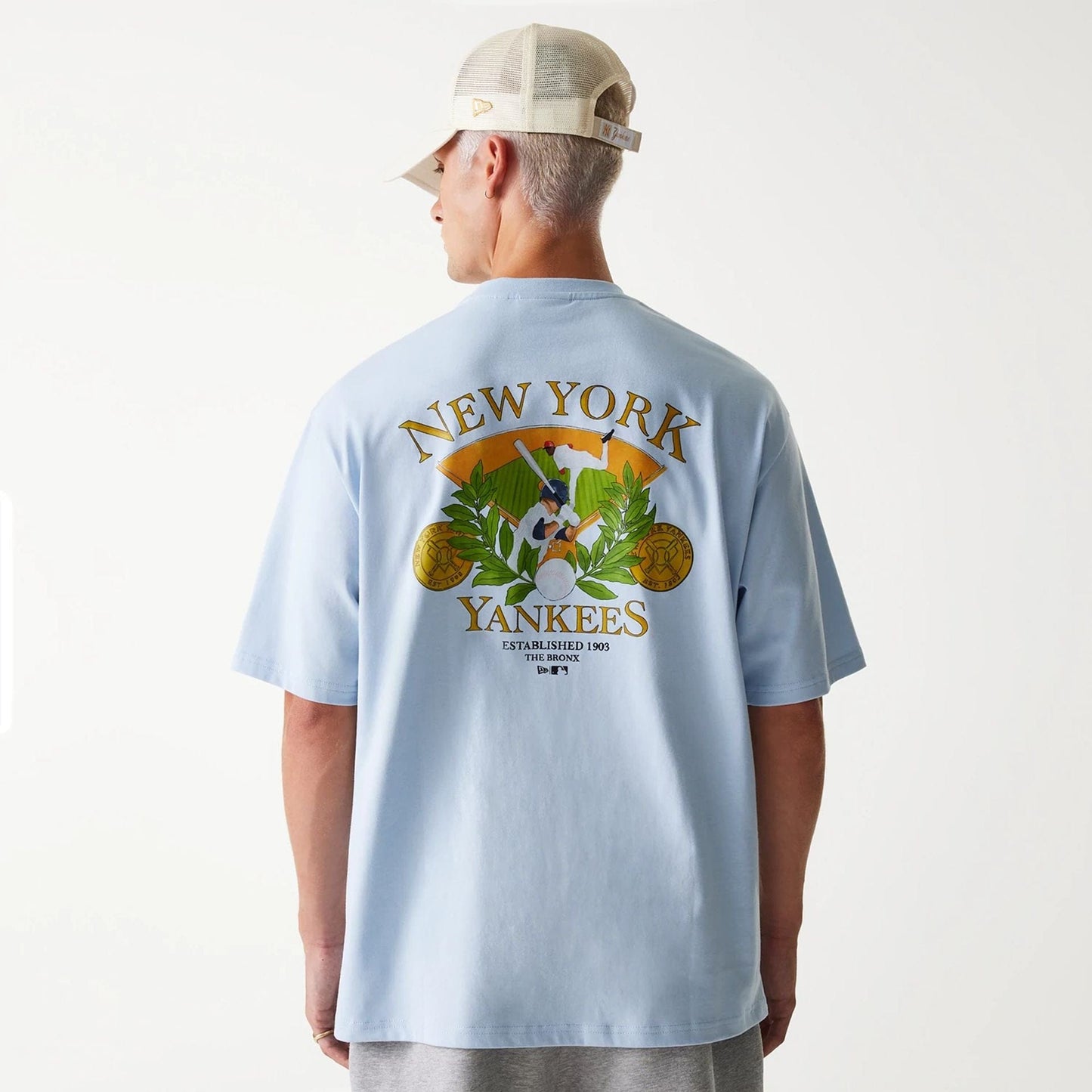 The Male model is wearing New York Yankees MLB Baseball Graphic Pastel Blue Oversized T-Shirt 2