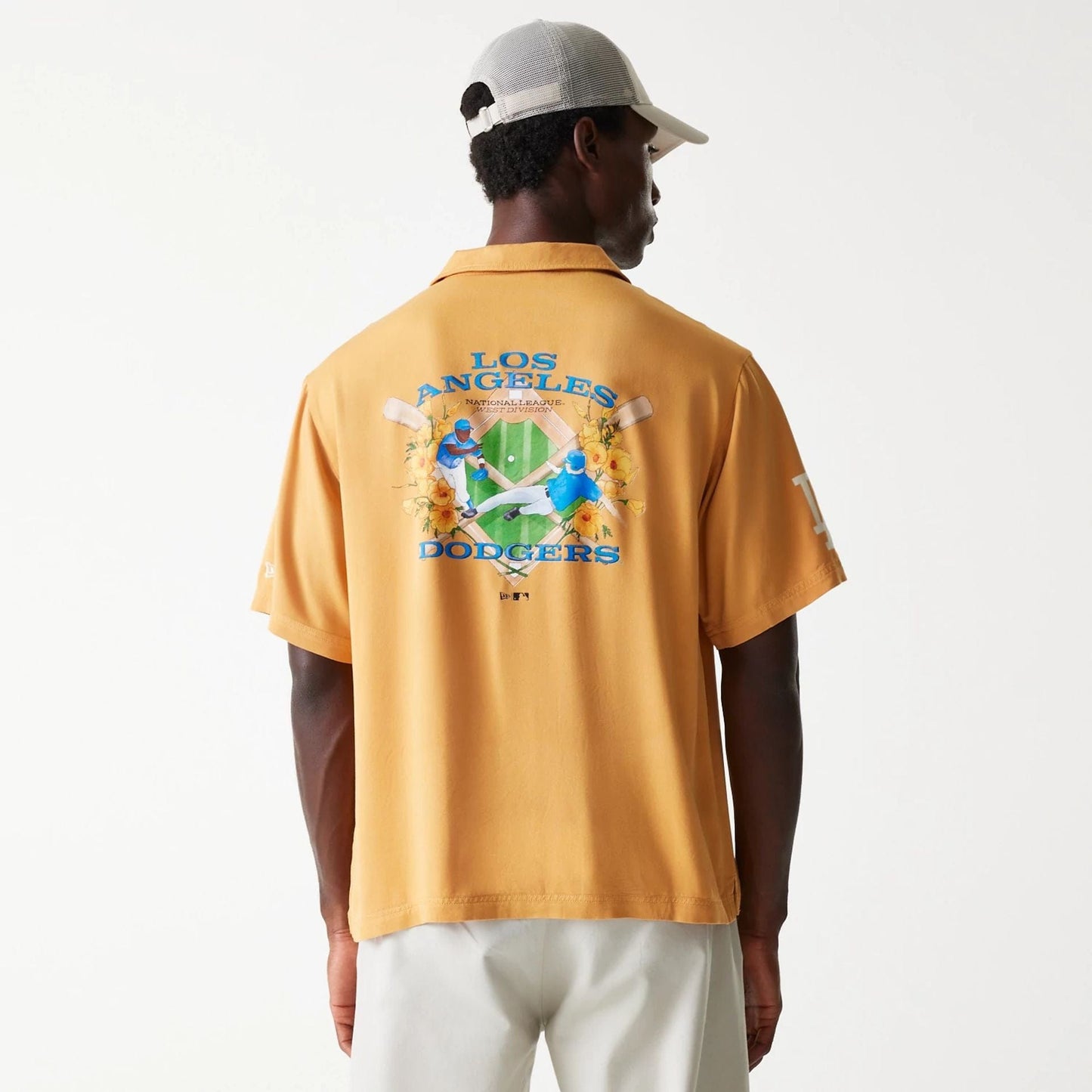 The Male model is wearing LA Dodgers MLB Graphic Beige Revere Short Sleeve Shirt 2