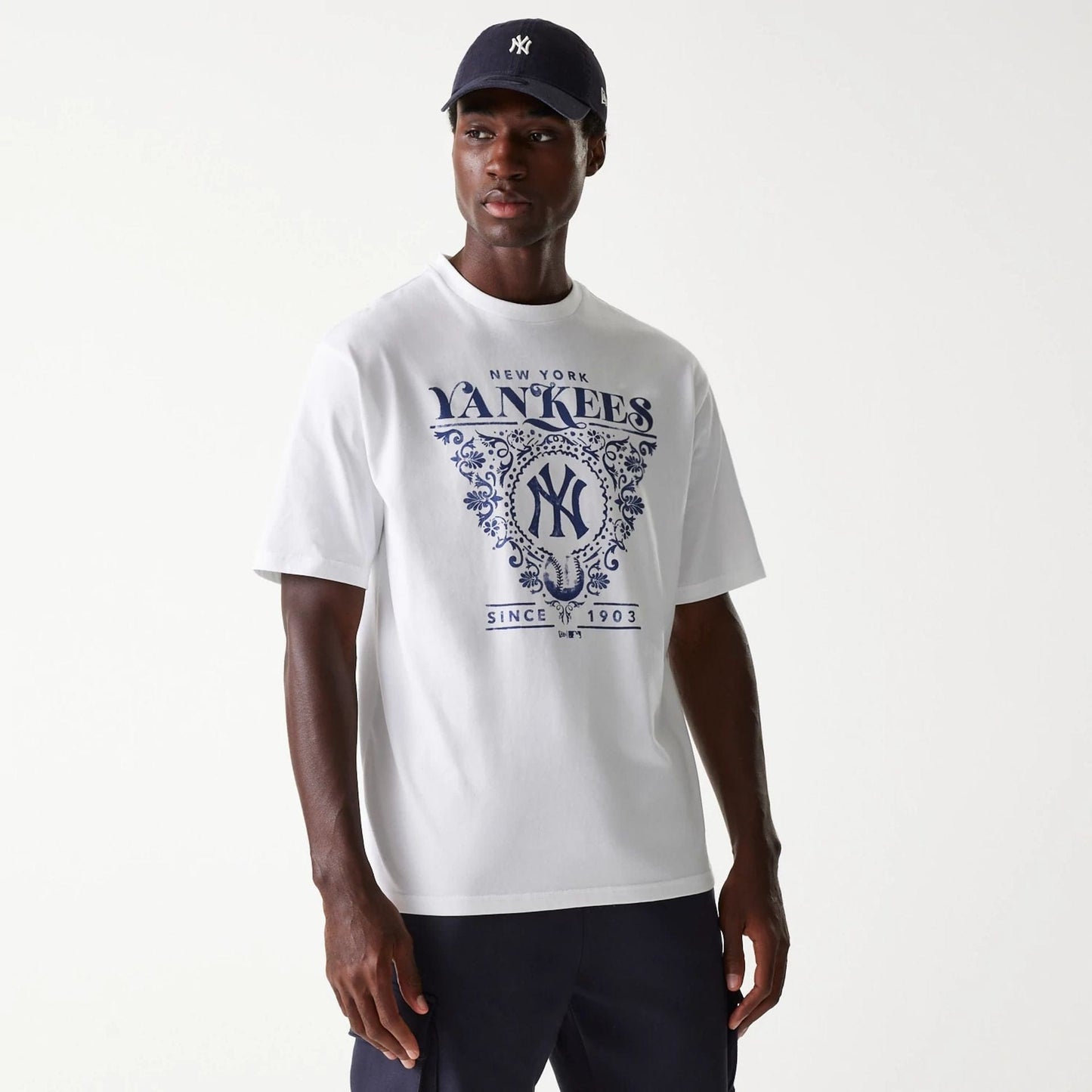 The Male model is wearing New York Yankees MLB Floral Graphic White Oversized T-Shirt 1