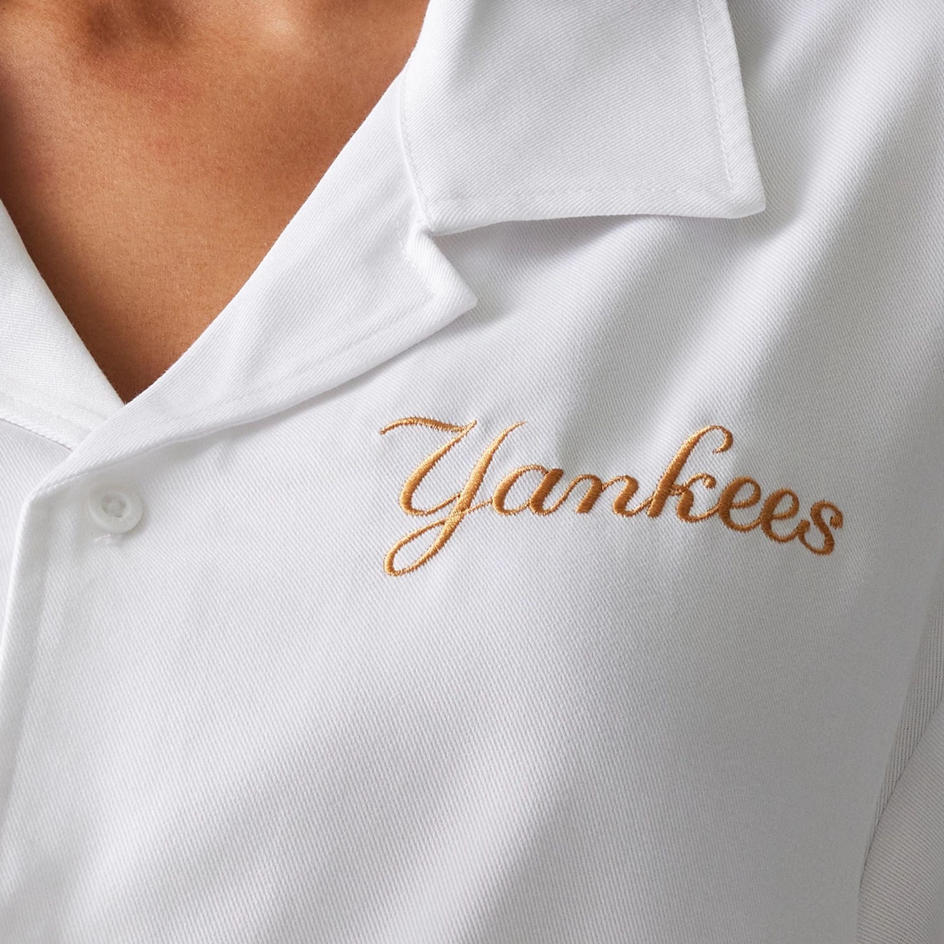 The Male model is wearing New York Yankees MLB Graphic White Revere Short Sleeve Shirt 6