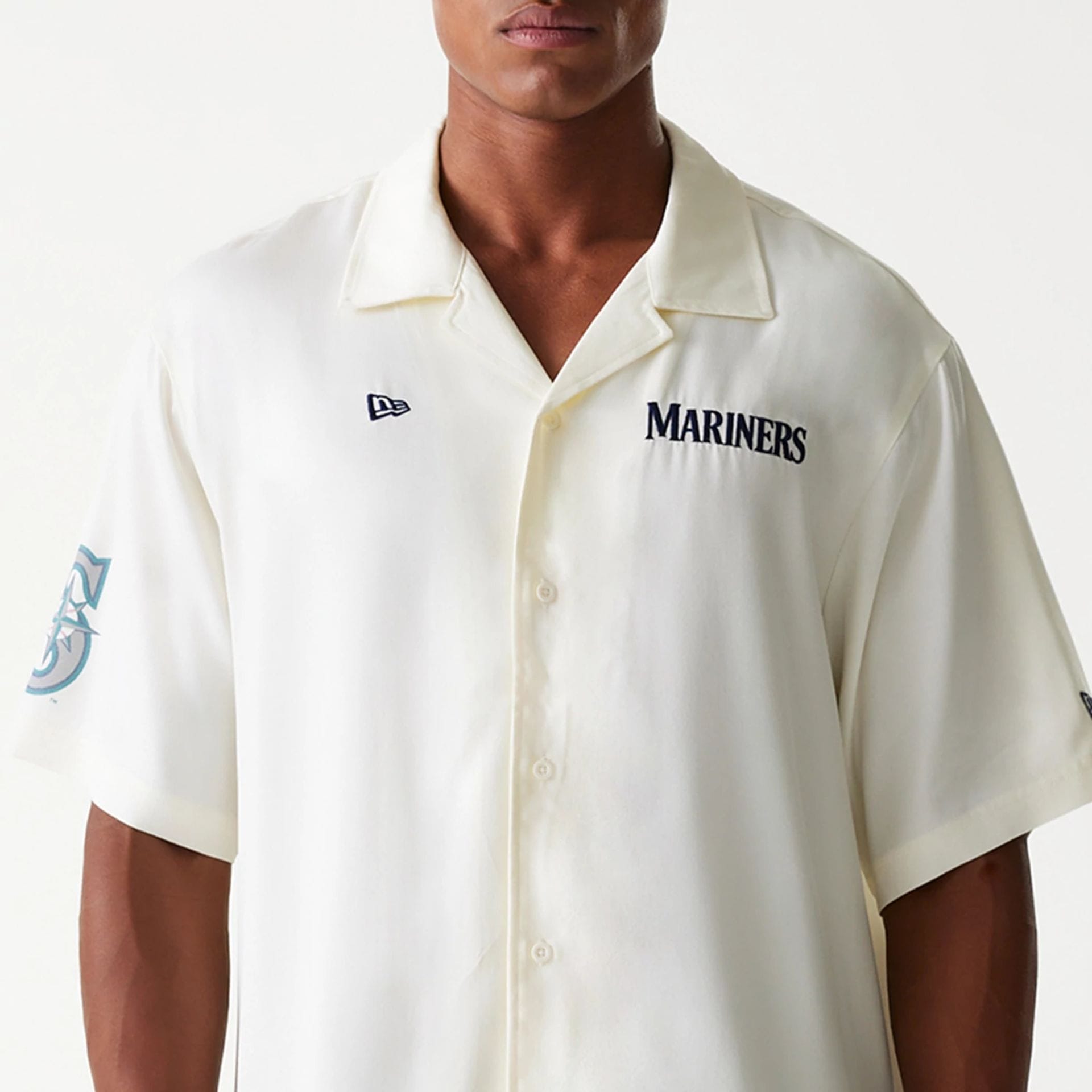 The Male model is wearing Seattle Mariners MLB Graphic Open White Revere Short Sleeve Shirt 3
