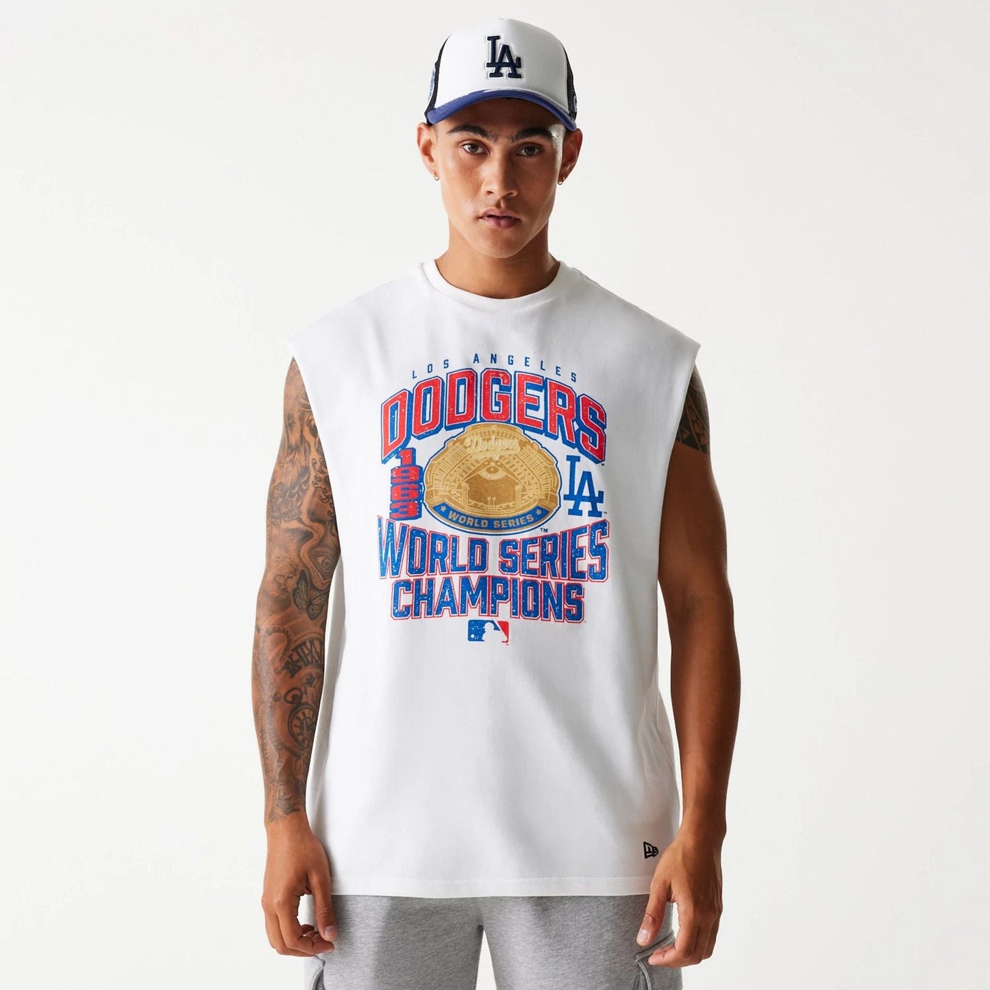 The Male model is wearing LA Dodgers MLB Graphic White Sleeveless T-Shirt 1