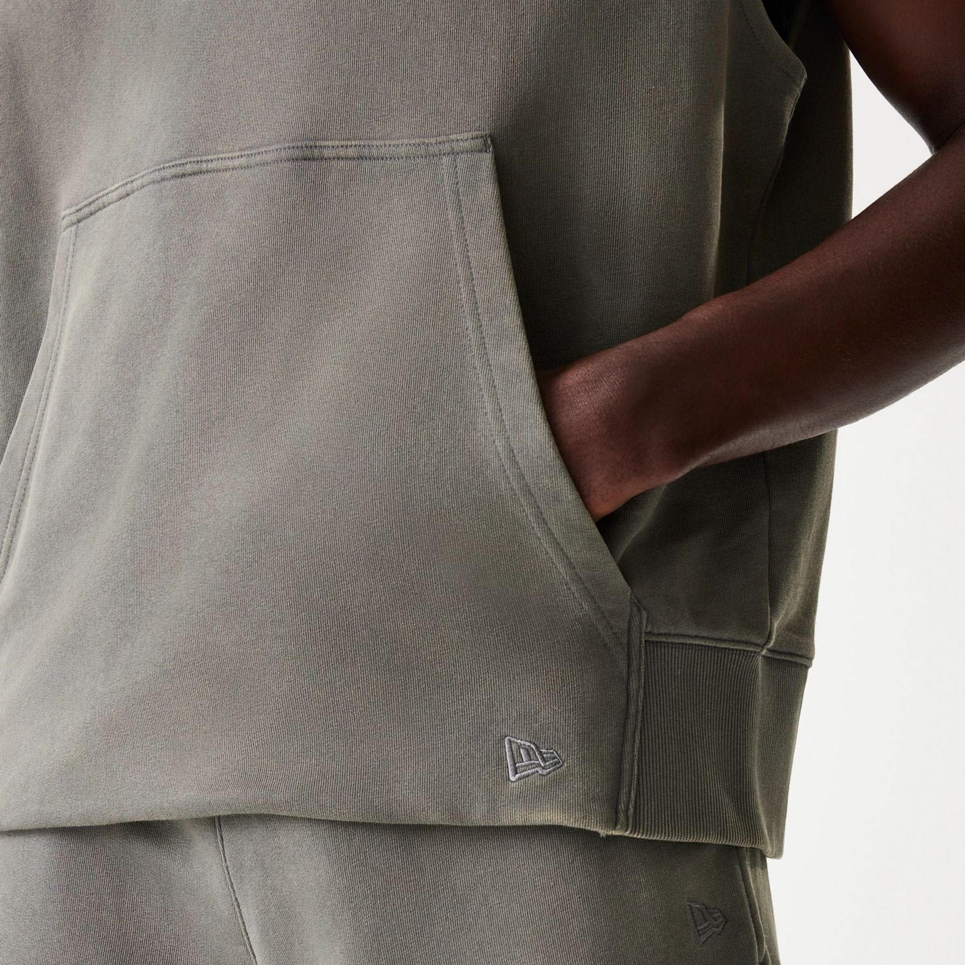 The Male model is wearing LA Lakers NBA Washed Grey Sleeveless Hoodie 5