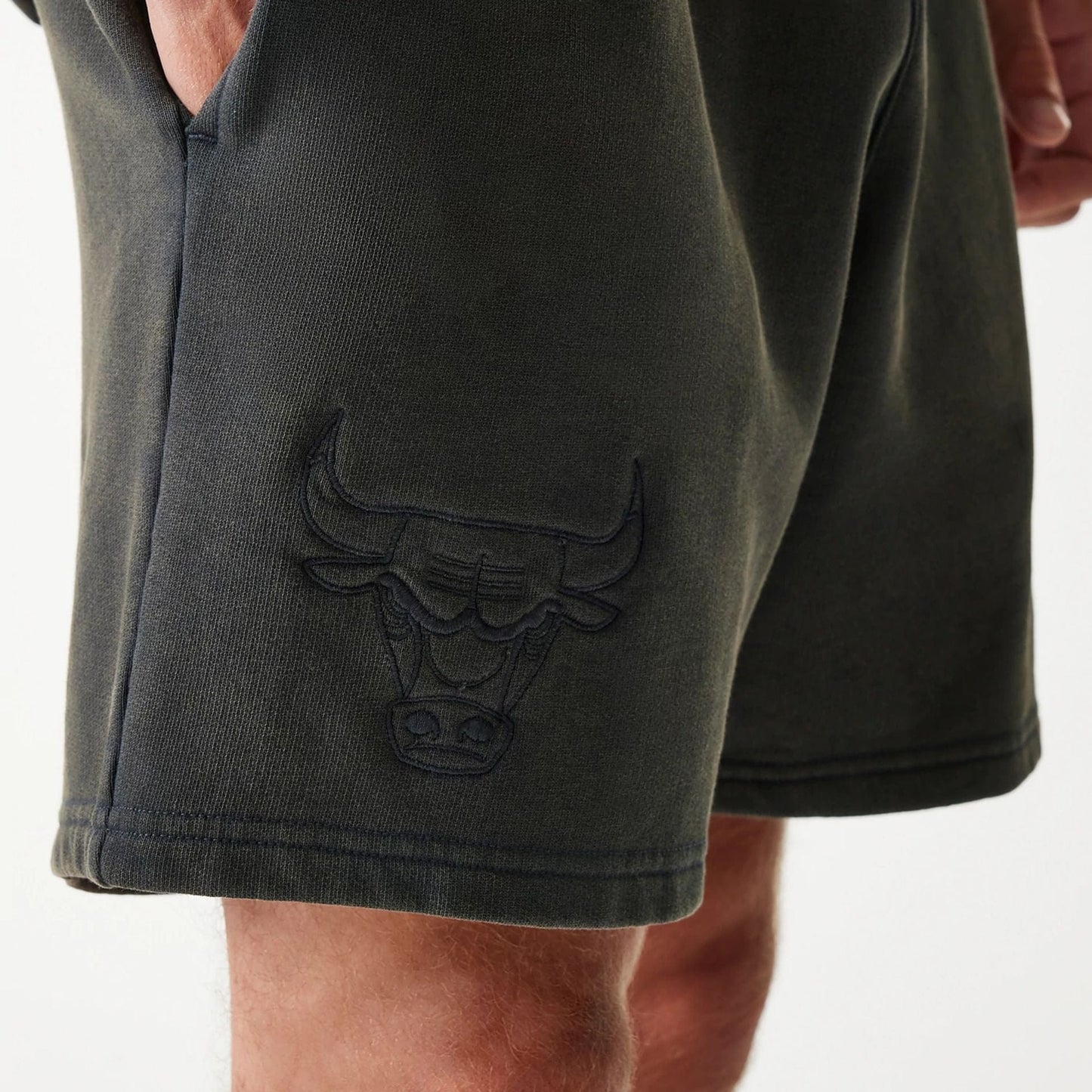 The Male model is wearing Chicago Bulls NBA Washed Grey Shorts 3