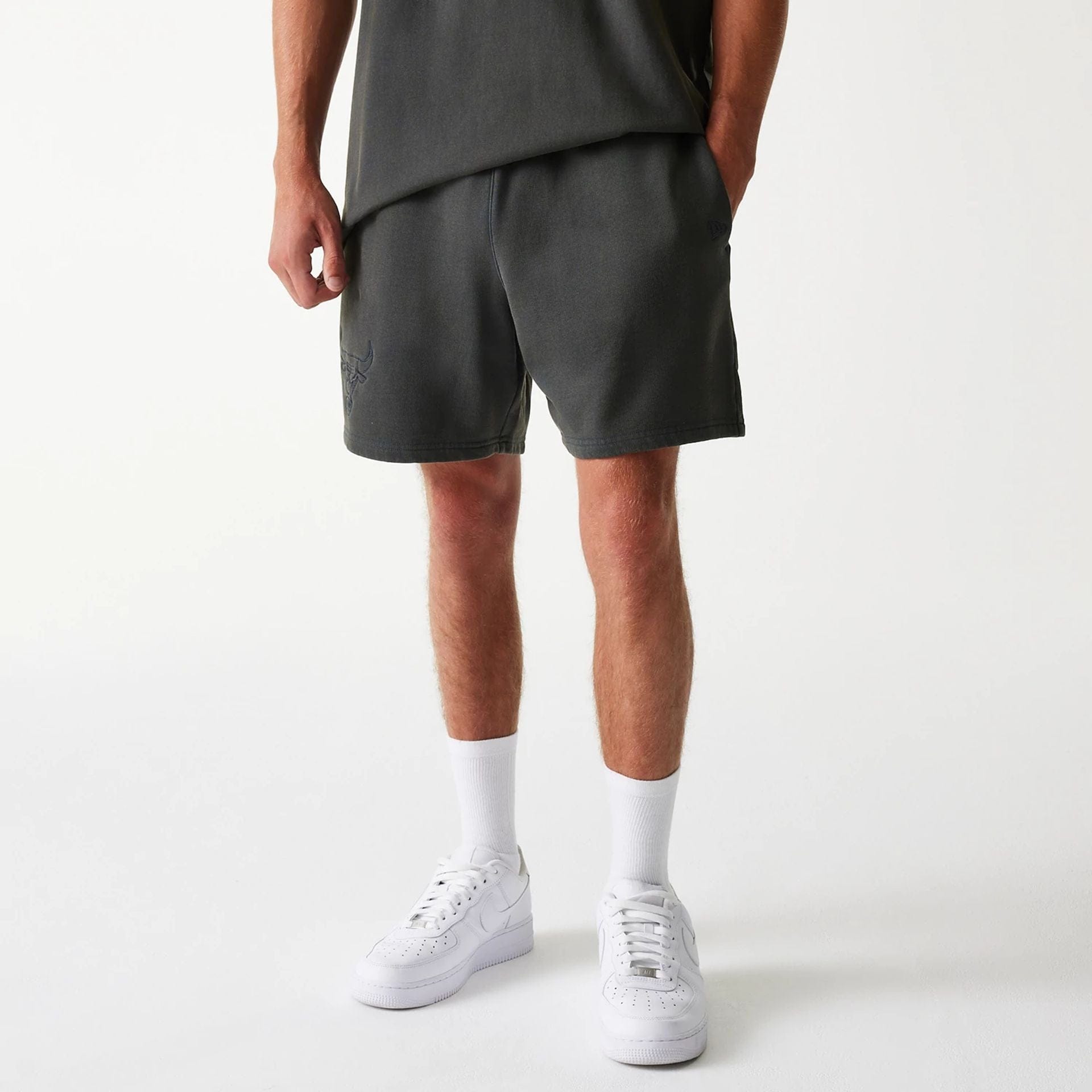 The Male model is wearing Chicago Bulls NBA Washed Grey Shorts 1