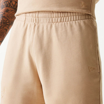 The Male model is wearing Chicago Bulls NBA Washed Beige Shorts 5