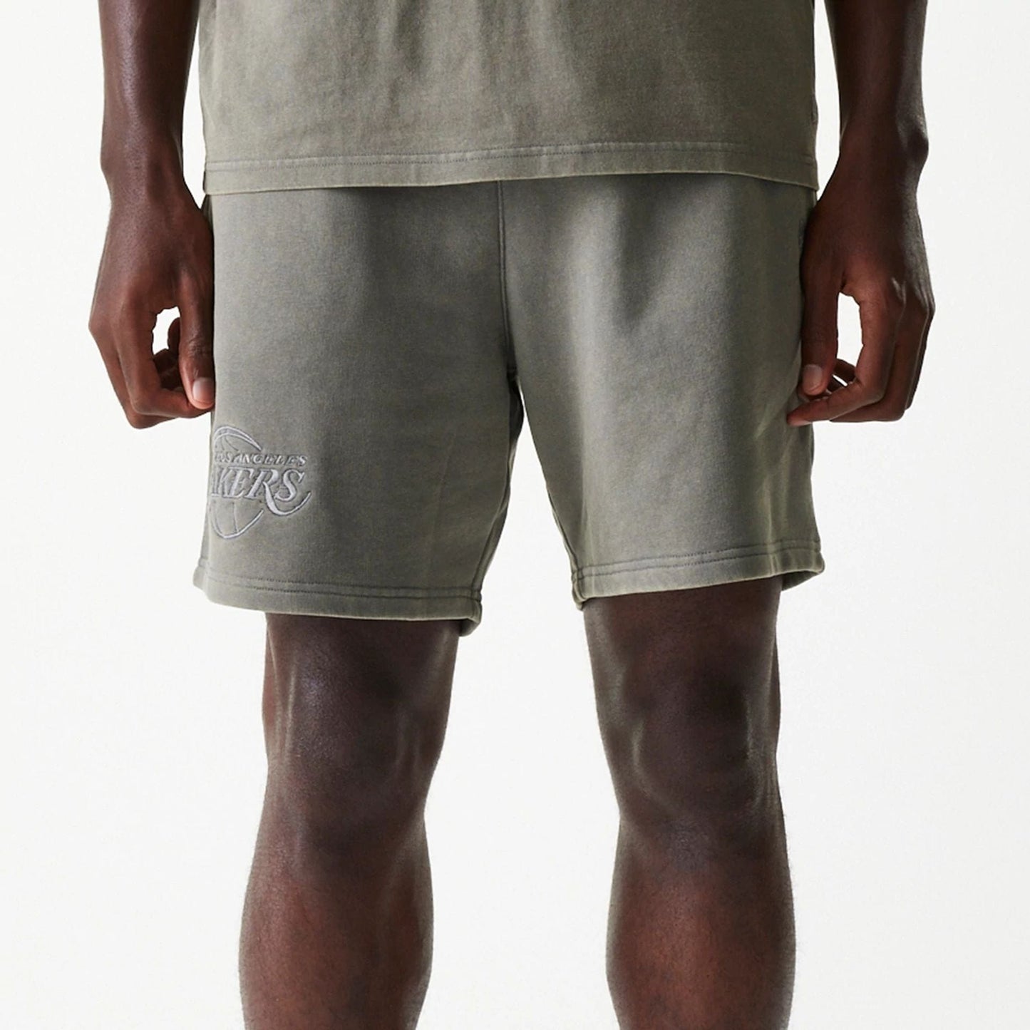 The Male model is wearing LA Lakers NBA Washed Grey Shorts 3