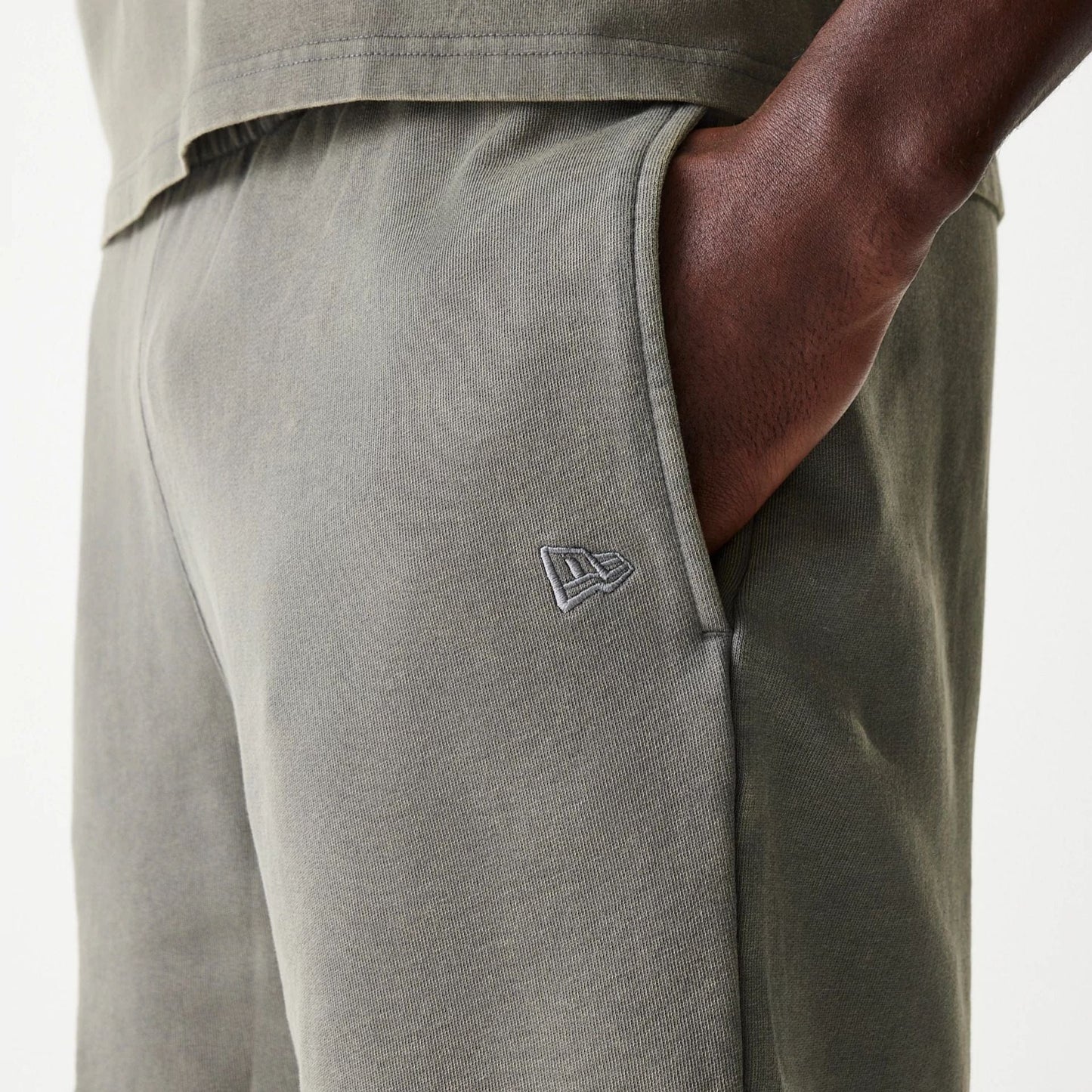 The Male model is wearing LA Lakers NBA Washed Grey Shorts 4