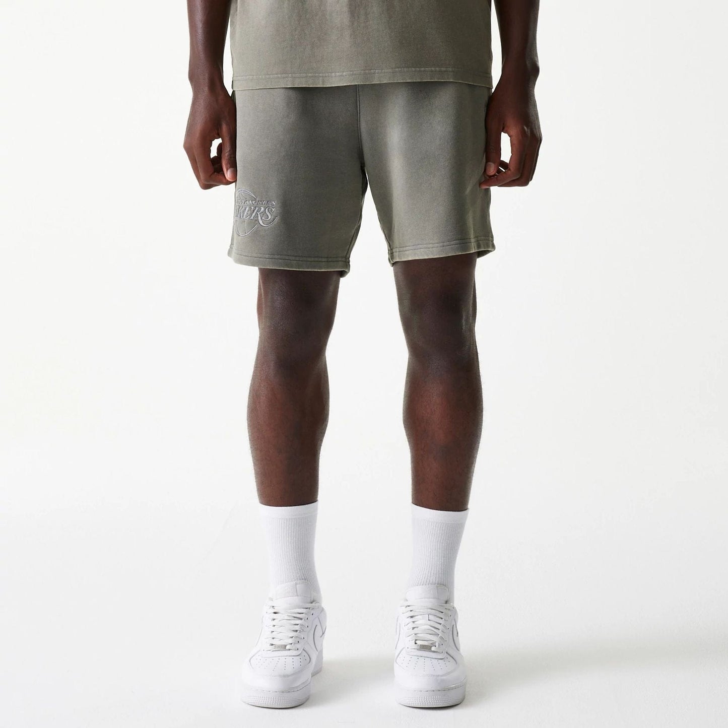The Male model is wearing LA Lakers NBA Washed Grey Shorts 1