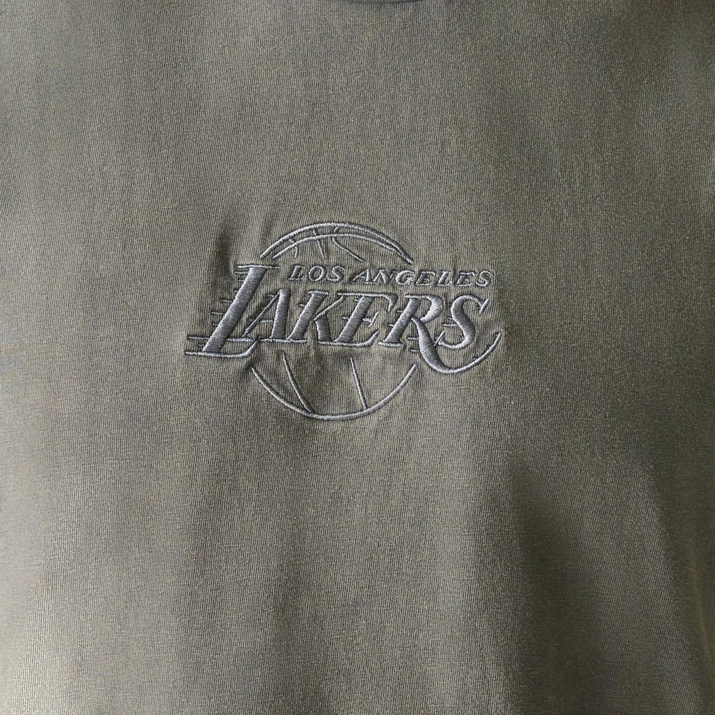 The Male model is wearing LA Lakers NBA Washed Grey Sleeveless T-Shirt 7