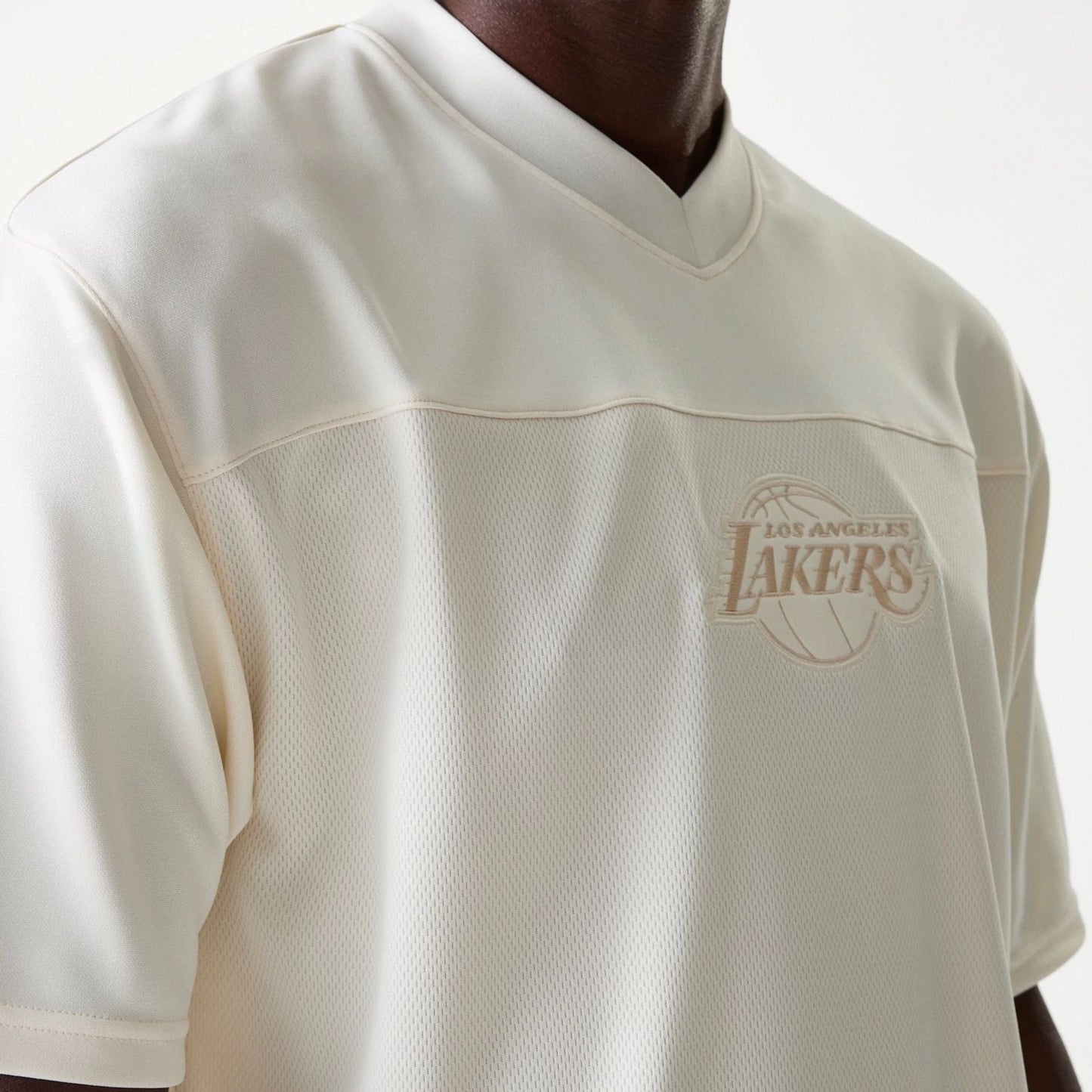 The Male model is wearing LA Lakers NBA Tonal Open White Mesh Jersey 4
