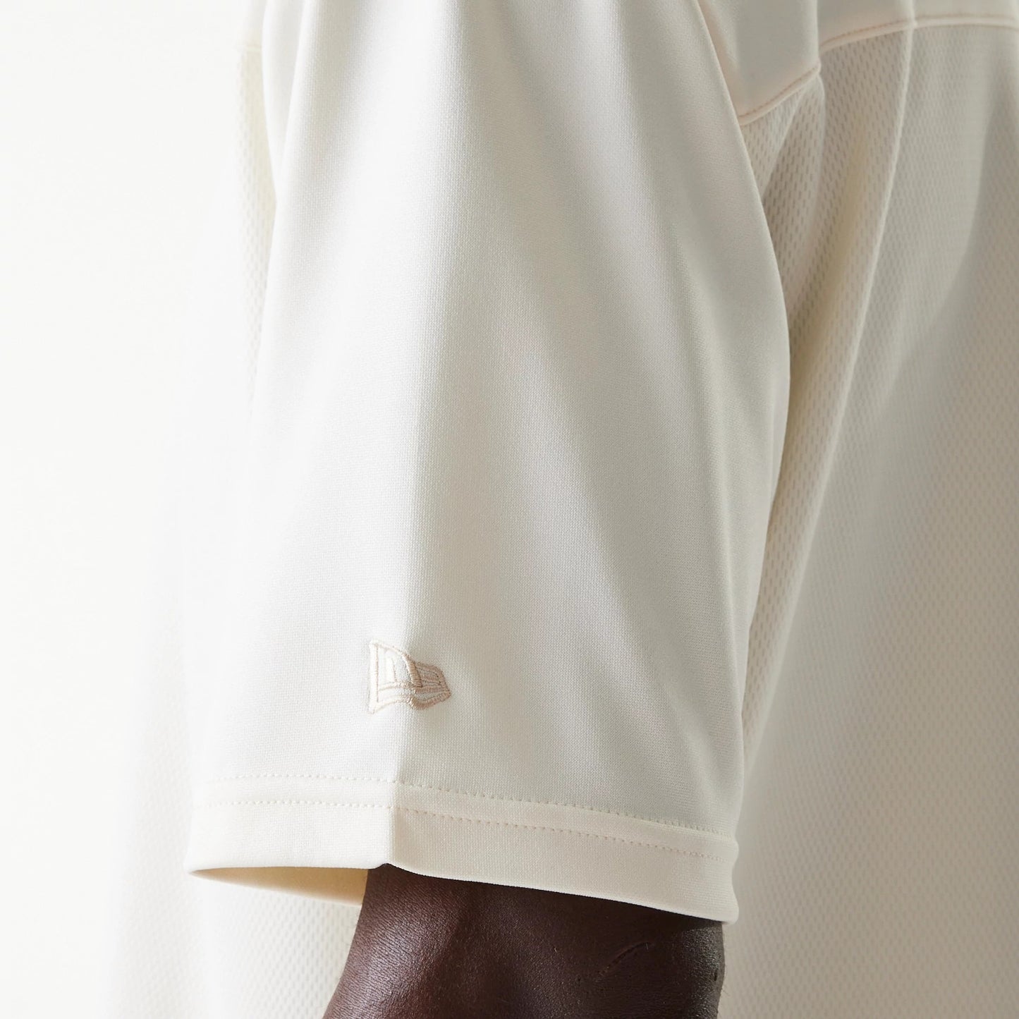 The Male model is wearing LA Lakers NBA Tonal Open White Mesh Jersey 5