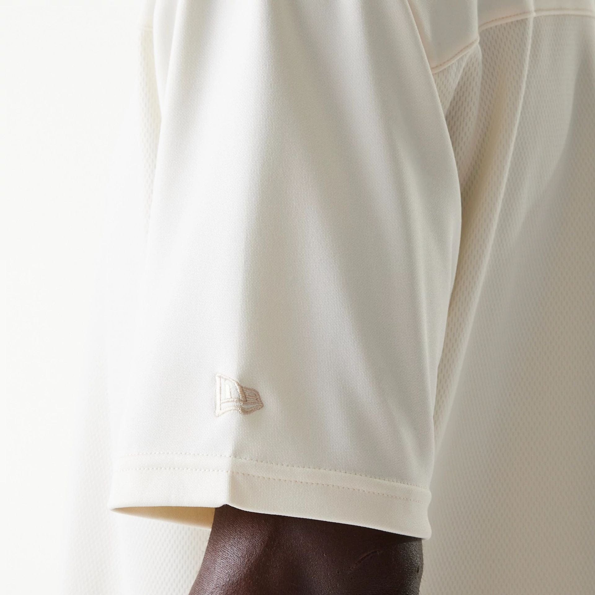 The Male model is wearing LA Lakers NBA Tonal Open White Mesh Jersey 5