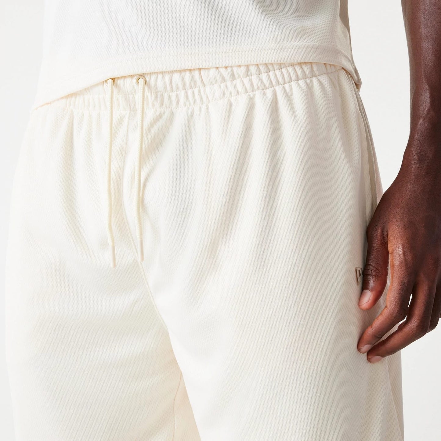 The Male model is wearing LA Lakers NBA Tonal Open White Mesh Shorts 5