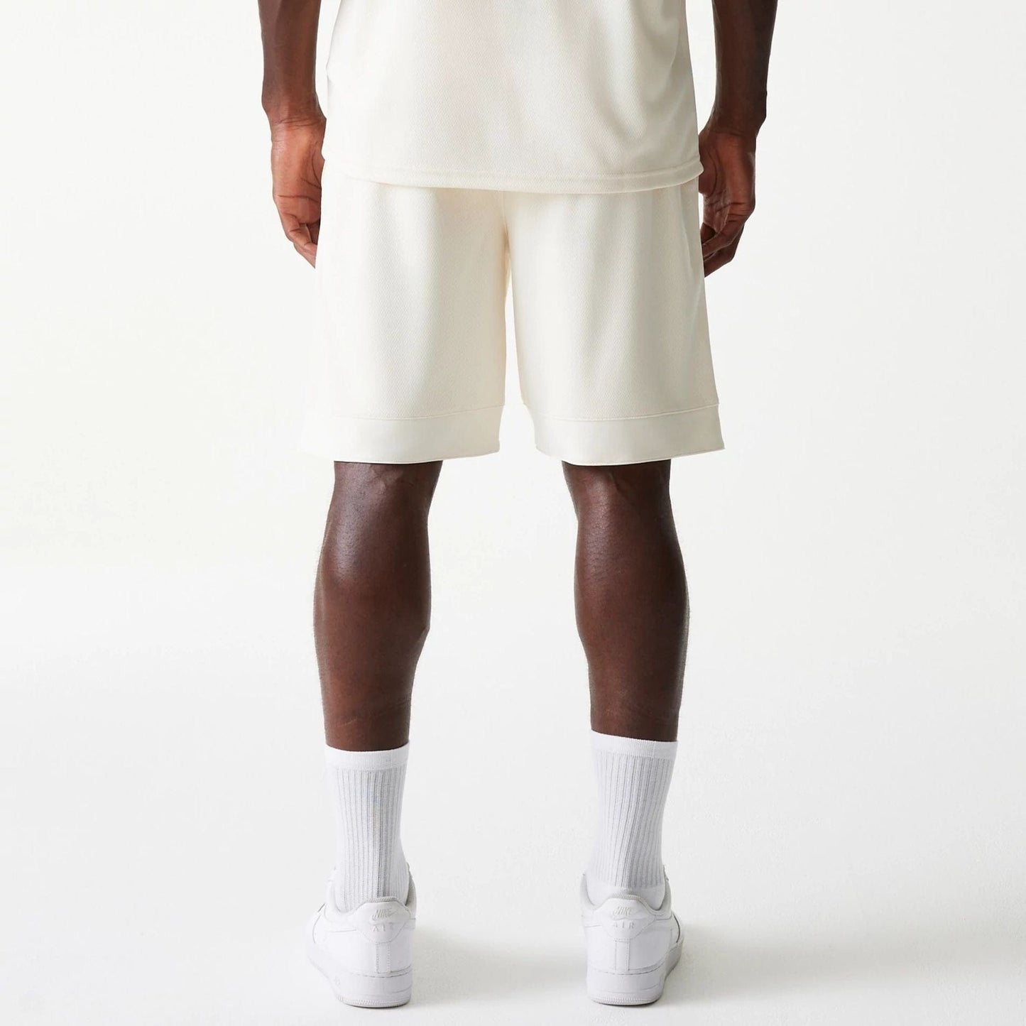 The Male model is wearing LA Lakers NBA Tonal Open White Mesh Shorts 2
