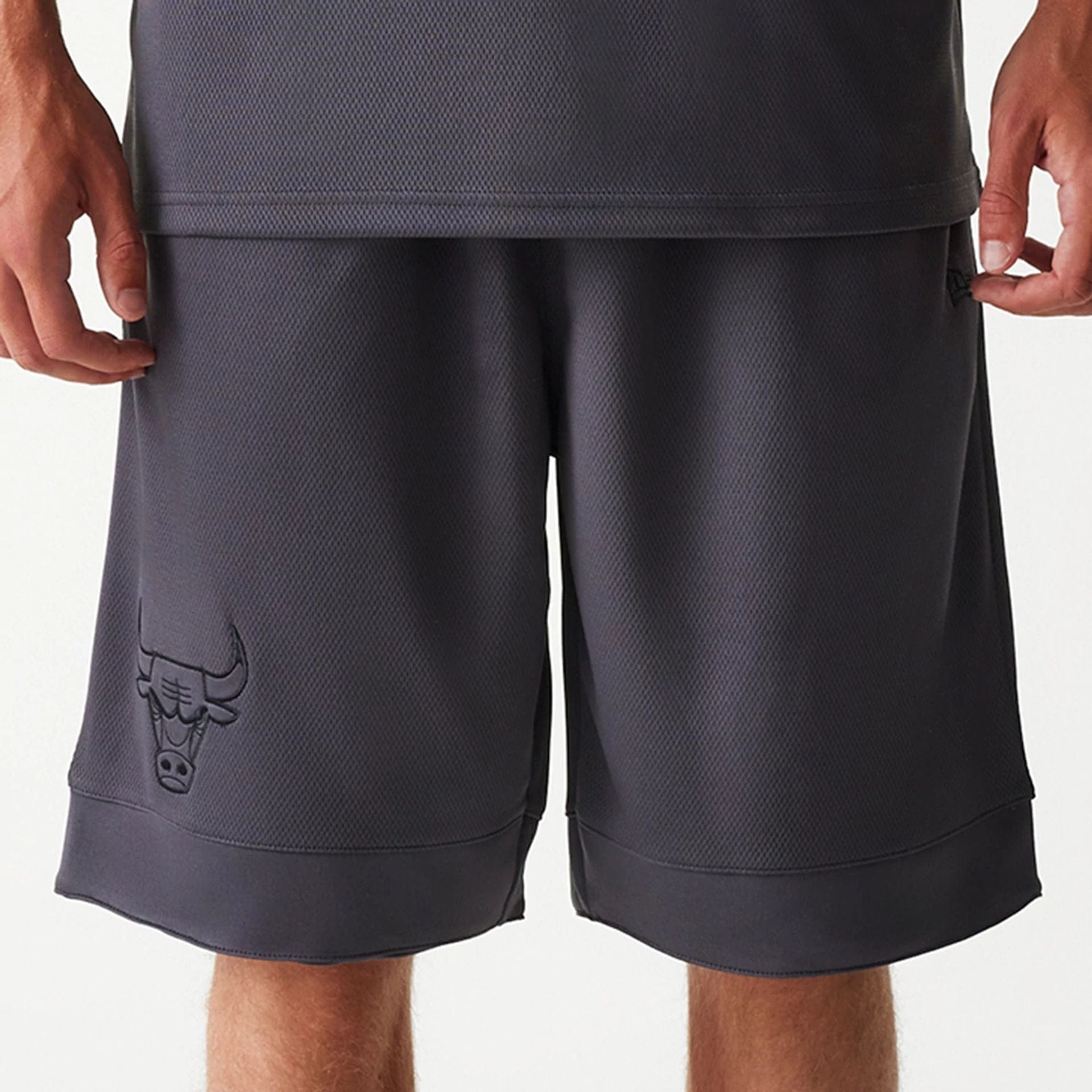 The Male model is wearing Chicago Bulls NBA Tonal Dark Grey Mesh Shorts 3