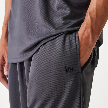 The Male model is wearing Chicago Bulls NBA Tonal Dark Grey Mesh Shorts 5