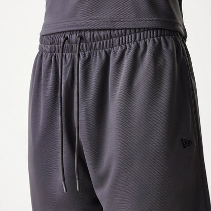 The Male model is wearing Chicago Bulls NBA Tonal Dark Grey Mesh Shorts 6